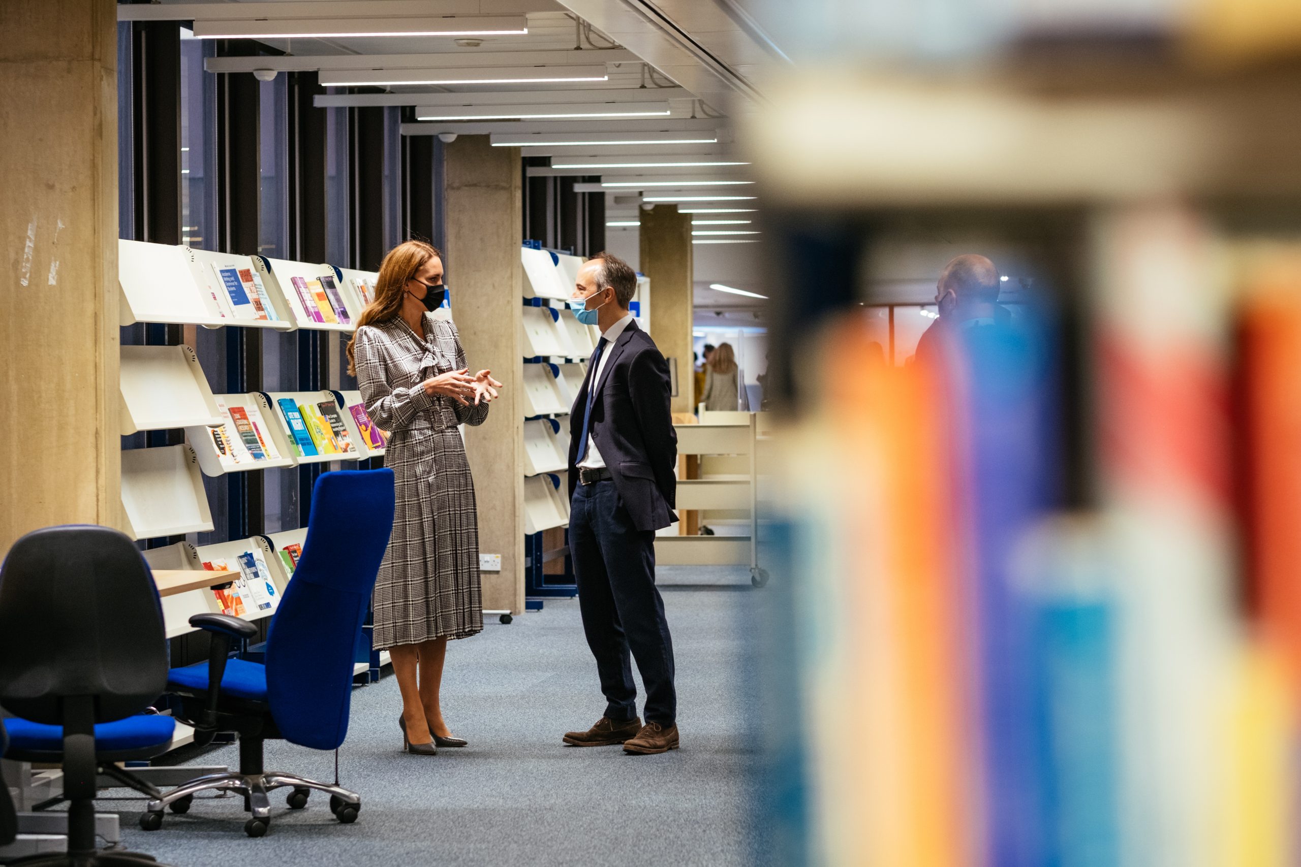 The Duchess of Cambridge and Pasco Fearon talking in the IOE Library